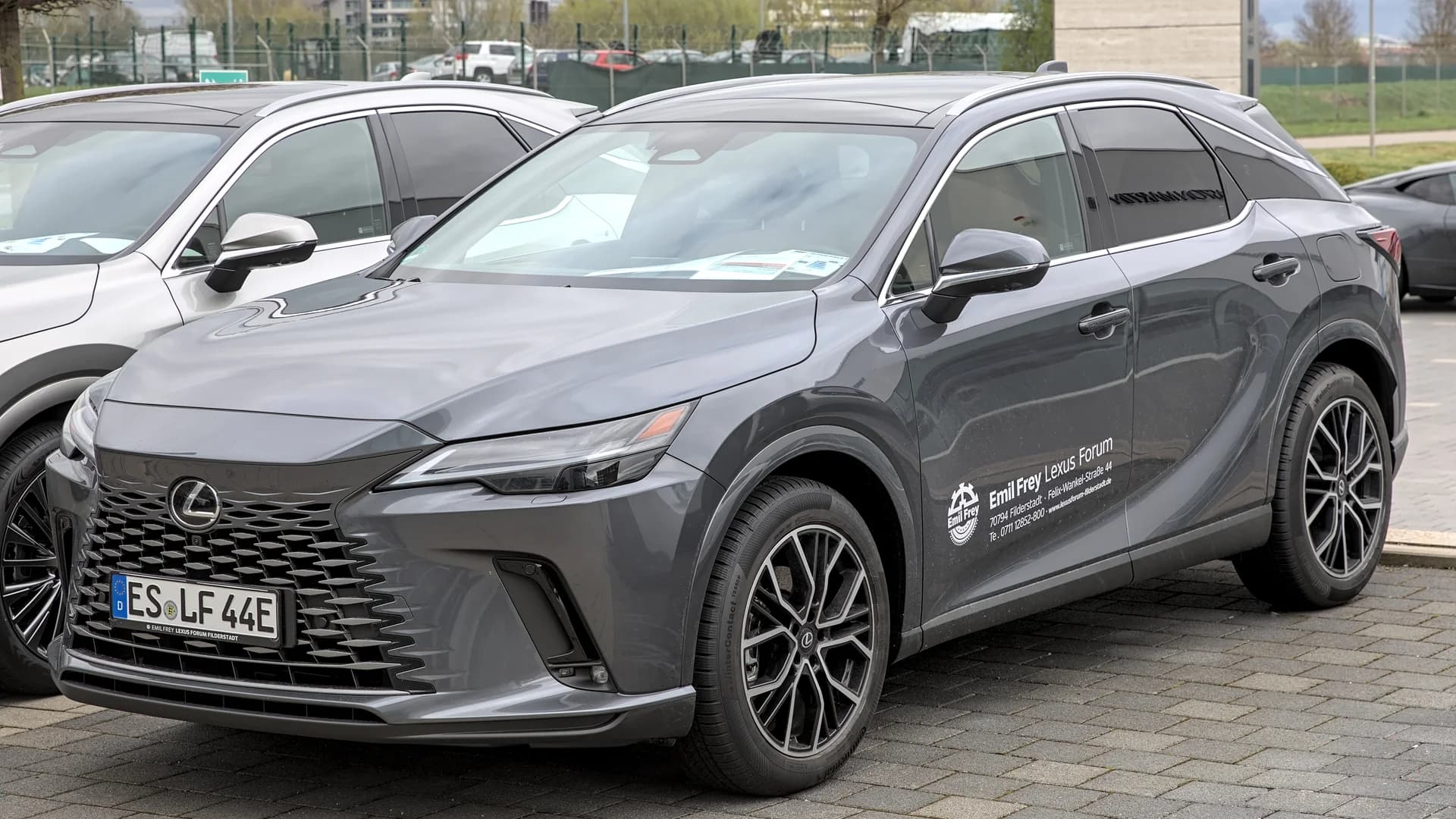 Current-generation Lexus RX 450h+ plug-in hybrid, front three-quarter view