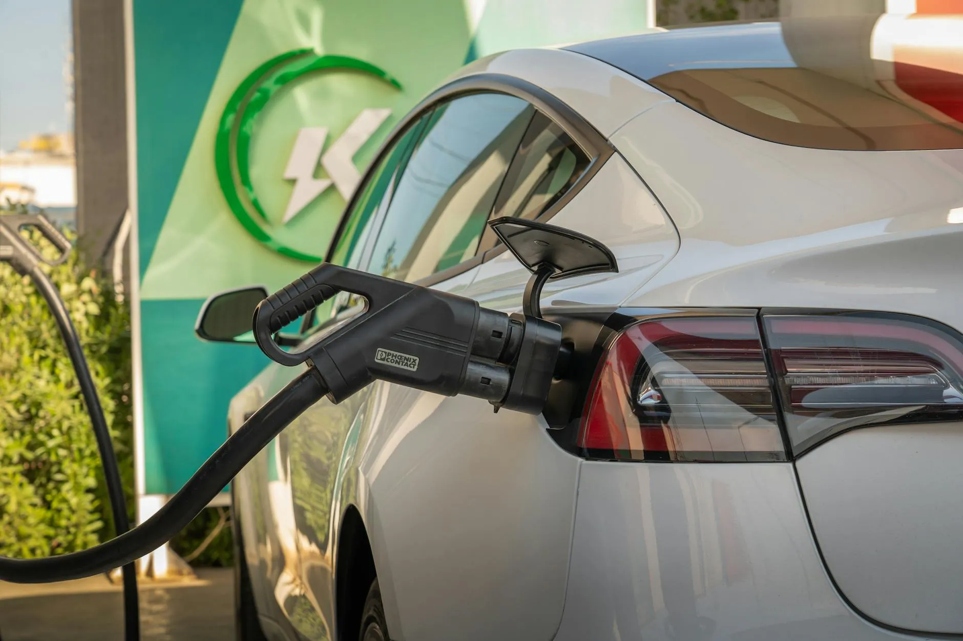 BYD and Tesla electric vehicles representing the global EV sales leadership shift in 2025-2026