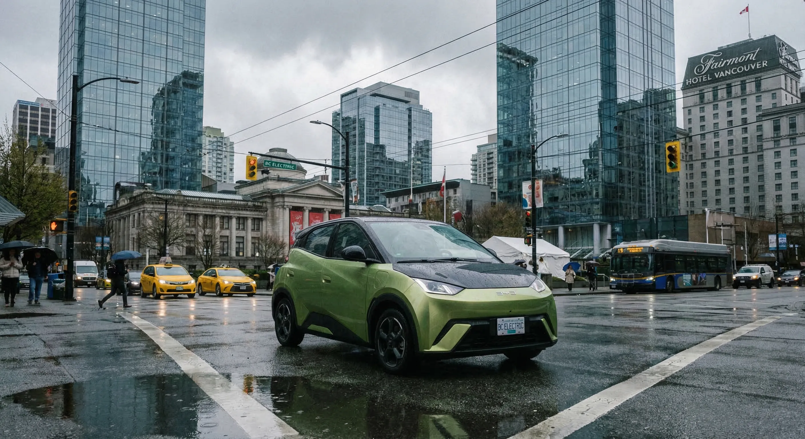 BYD Seagull compact EV in an urban Canadian city setting with modern architecture