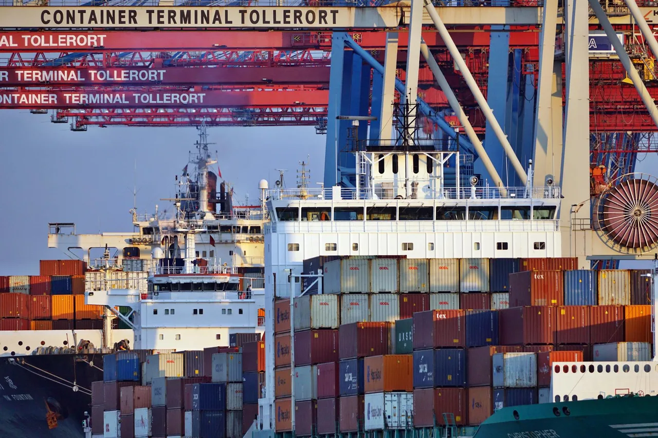 Shipping containers at a cargo port representing international EV trade barriers between China and North America
