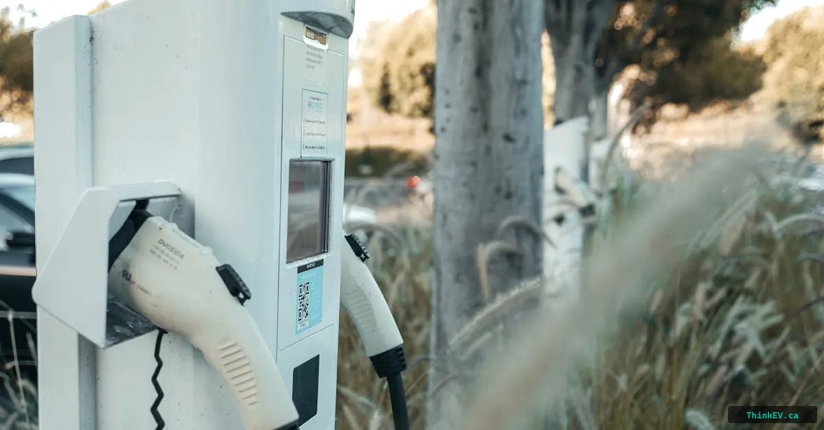 Electric vehicle charging in a Canadian winter setting showing cold-weather battery performance