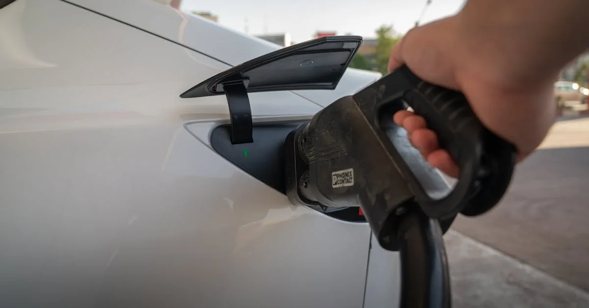 Electric vehicle charging at a Canadian highway corridor DC fast charger during an EV road trip