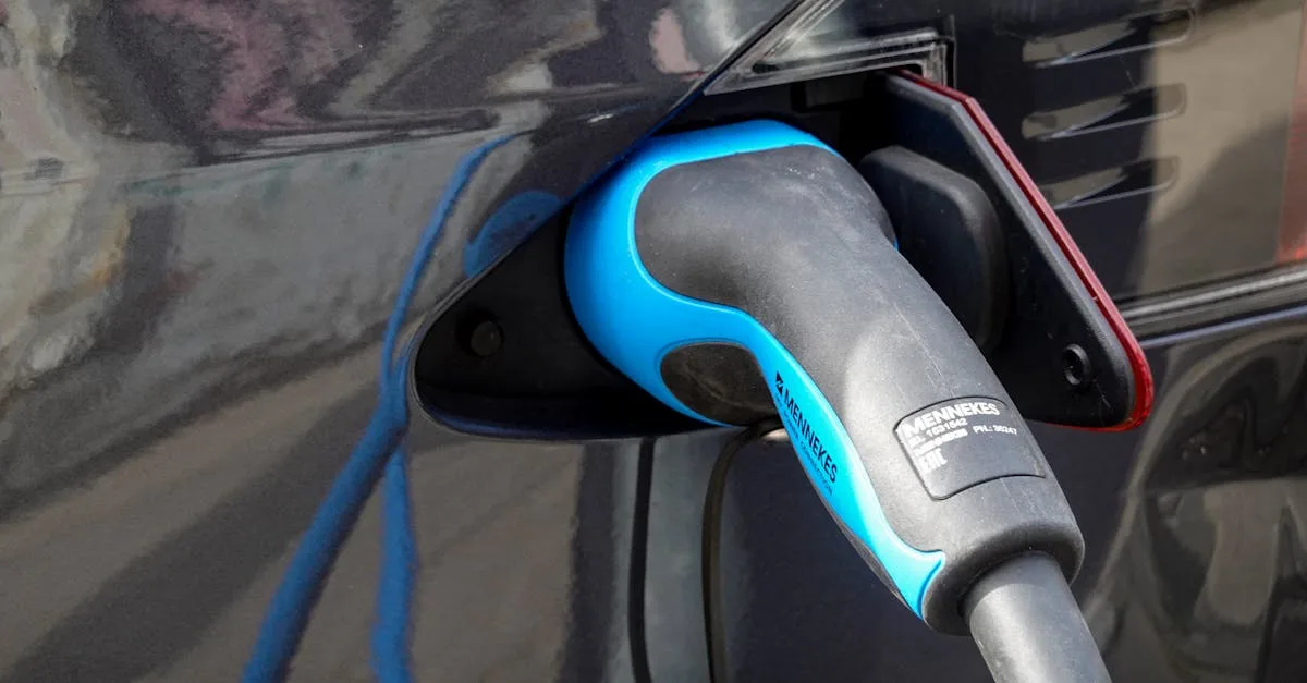 Electric vehicle driving through a Canadian mountain market on a summer road trip with clear skies