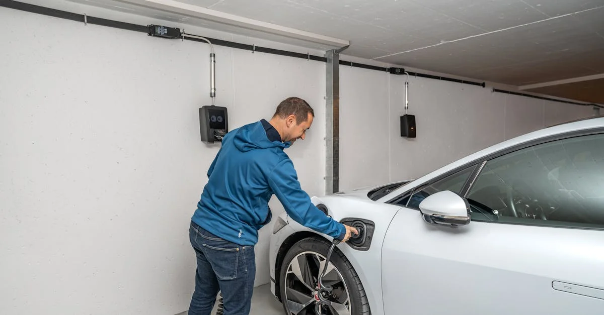 EV owner reviewing unexpected costs and bills in Canadian garage setting