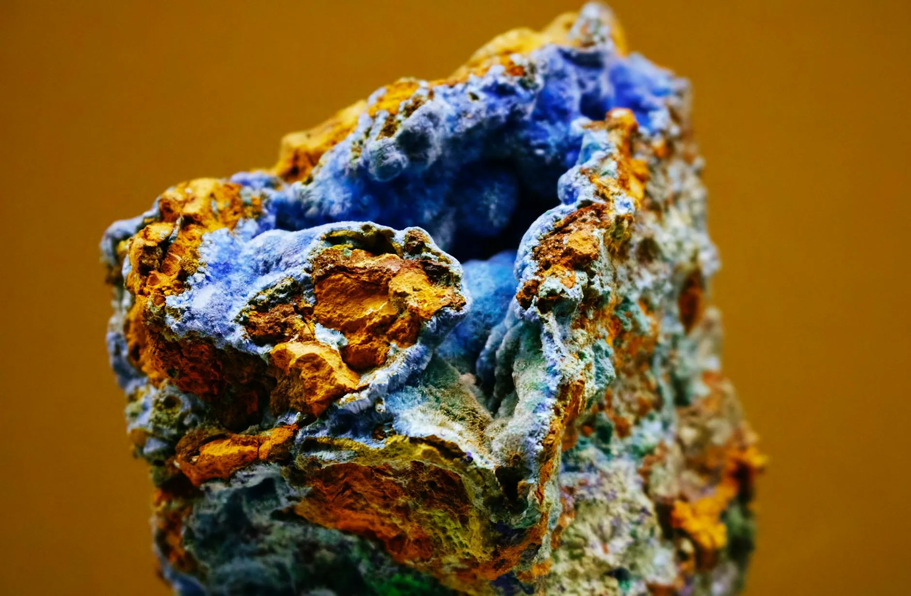 Close-up of a person plugging in an electric car at a charging station outdoors.