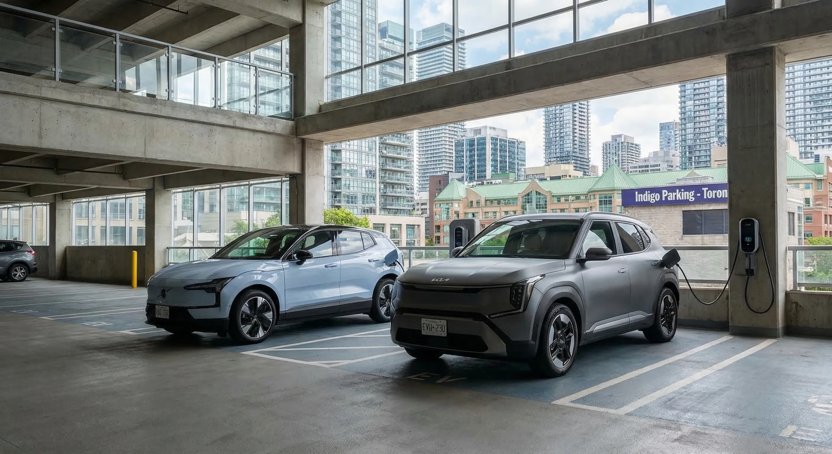 Volvo EX30 and Kia EV3 compact electric cars parked side by side in a modern Canadian urban parking garage, compact EV comparison