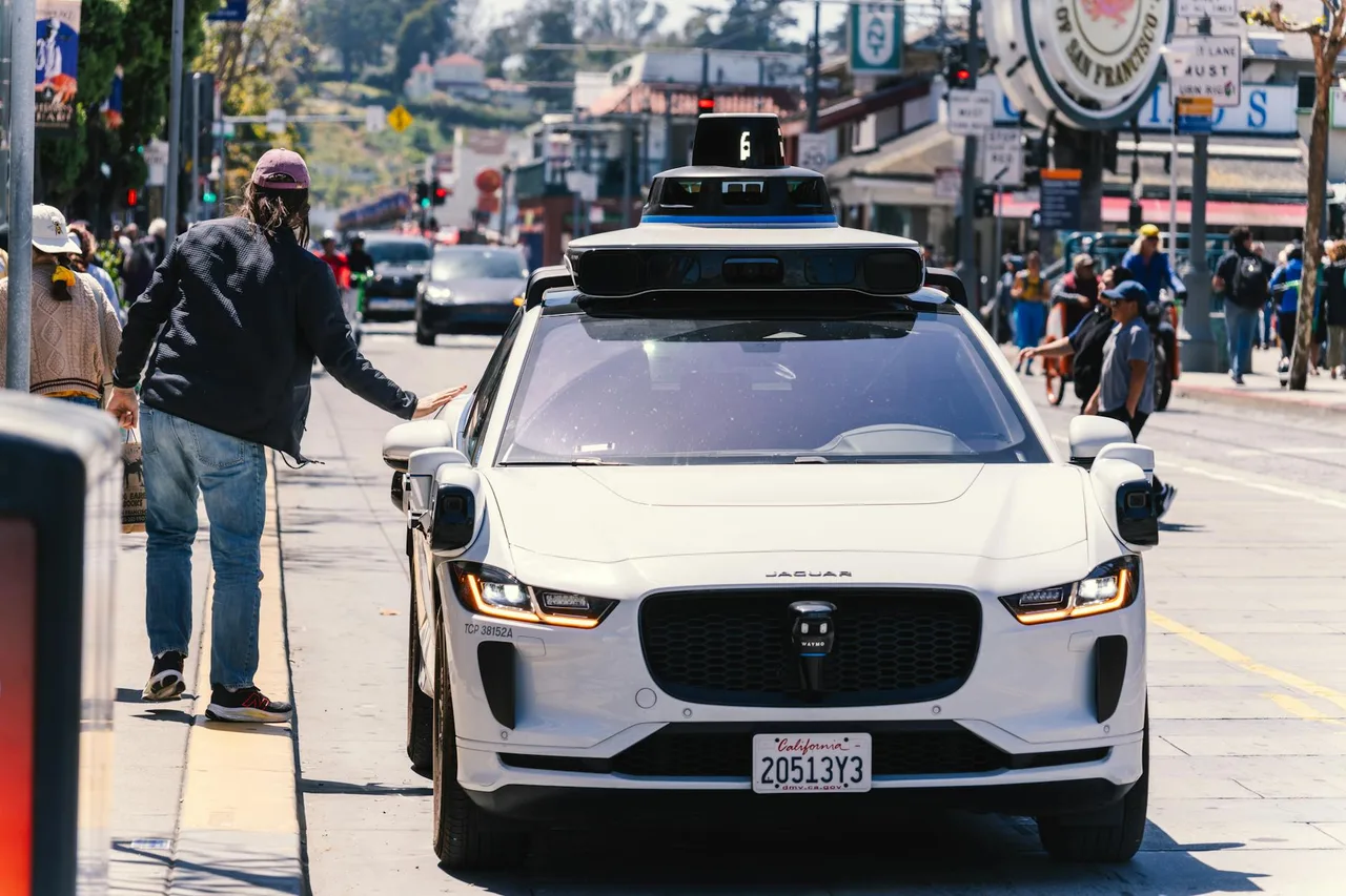 Autonomous vehicle equipped with lidar sensors and cameras, representing the different self-driving approaches by Waymo, Tesla FSD, and Cruise